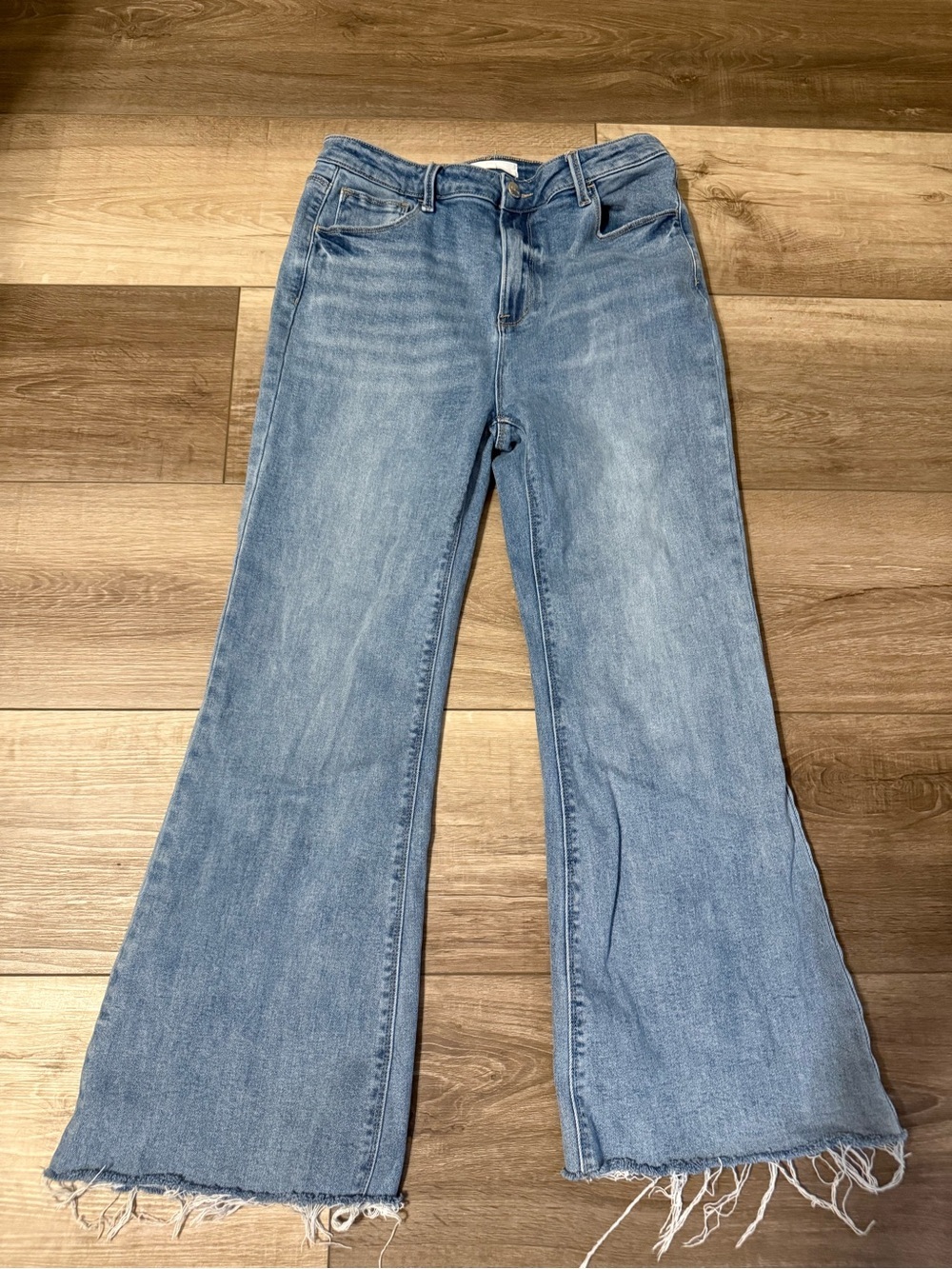Risen Jeans- Light Blue High-Rise Flare Jeans with Raw Hem